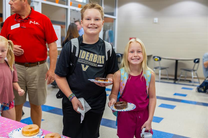 Sunset Elementary hosts Donuts with Grown-Ups